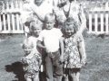 Left to right back row: Marie holding Linda, Teressa. Front row: Nancy, Diane, Steven, Kathleen. Picture taken at Holley and Eva's home 1944 or 1945.