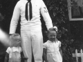 Brett, Rondo, Sheila at home on Sexton Street in Blackfoot. Rondo in military uniform
